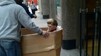 Woman in a box, West 5th Street, NYC